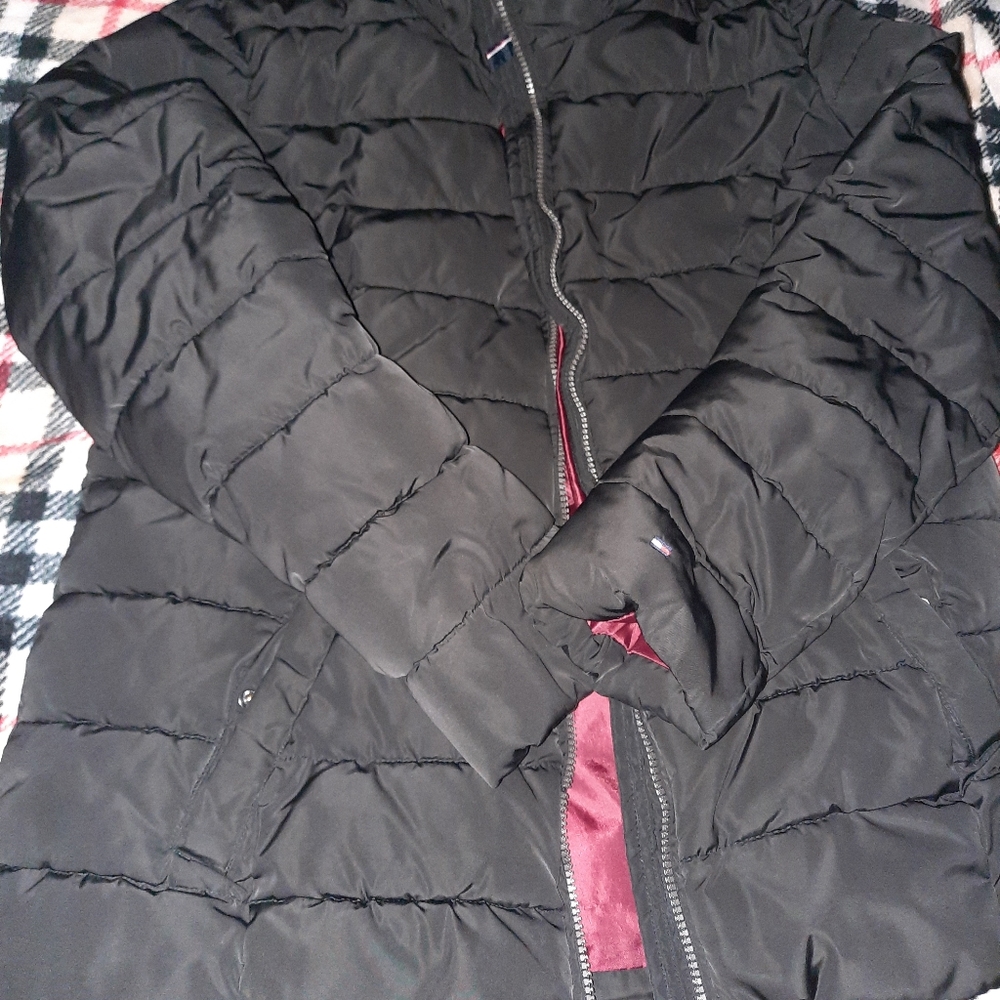 medium black Tommy Hilfiger puffer jacket.